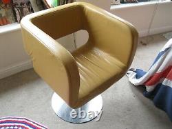 1970s chair brown tan leather swivel heavy funky retro vintage lobby Leeds