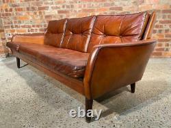 A Neat Vintage 1970s Three seater Patinated Tan Leather Sofa