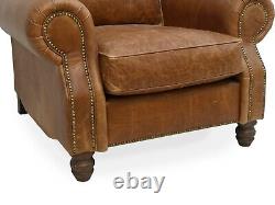 A Pair Of Leather Armchair Club Chairs In Vintage Tan Leather The Hepburns