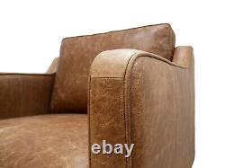 A Pair Of Vintage Leather Arm Chairs And footstool Genuine Vintage Tan Leather