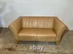 A Tan Leather Two Seater Sofa By IKEA