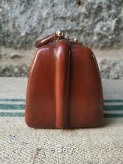 A Vintage Tan Leather Gladstone Bag by Revelation