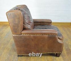 Aged brown tan leather wingback fireside tub chair armchair