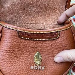 Dooney & Bourke Vintage Tan Pebble Leather Saddle Cavalry Belt Crossbody Bag