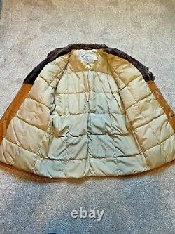 Men's 1970s vintage Schott tan leather shearling coat, size 40, quilted lining