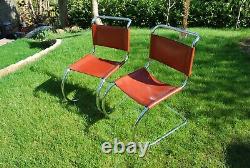 Two vintage/retro chrome cantilever chairs tan leather back and seat