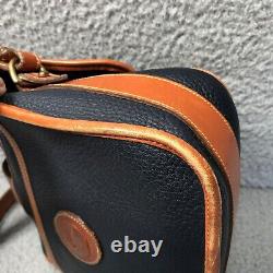 Vintage Dooney & Bourke Navy Blue pebbled leather tan trim saddle crossbody bag