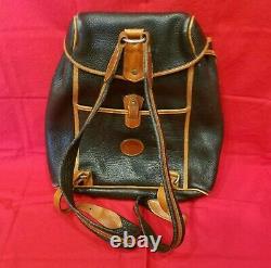 Vintage Dooney and Bourke Black & Tan Pebbled Leather Drawstring Backpack Purse