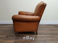 Vintage French Worn Tan Leather Moustache Armchair