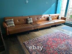 Vintage Tan Leather 7 Seat Couch on a Black Painted Wooden Frame 4450mm long