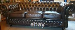 Vintage leather chesterfield sofa chestnut brown on gold tan